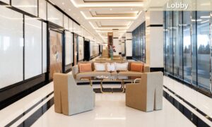 Bay House Monaco luxury lobby lounge with seating area and marble interior design