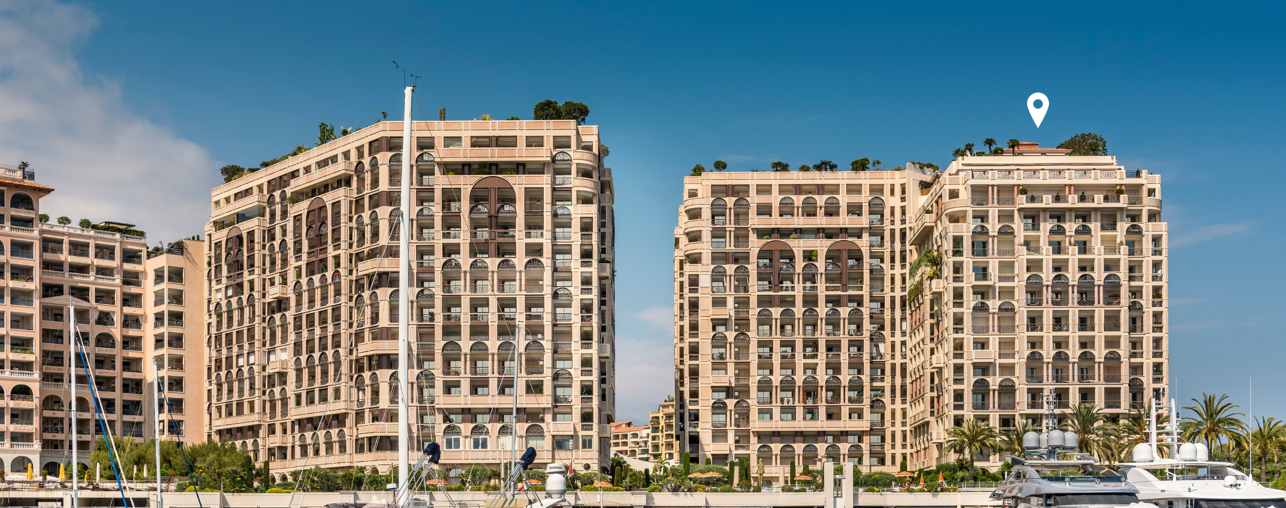Palazzo Leonrado amongst other buildings in Fontvieille, marked with a white location pin